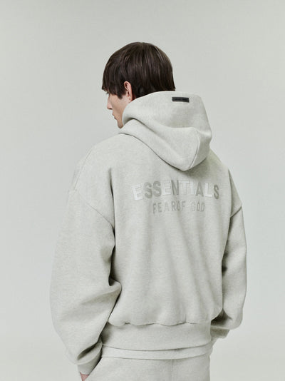 FEAR OF GOD ESSENTIALS Metallic Logo Fleece Hoodie ‘Heather Stone’ SP25