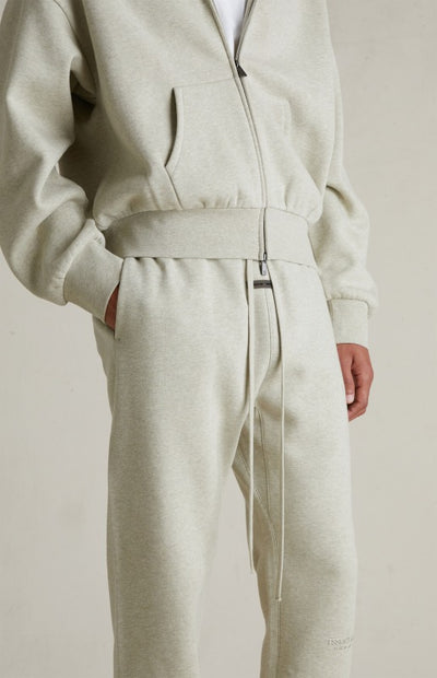 Fear Of God Essentials Vintage Metallic Logo Sweatpants ‘Heather Stone’ SP25