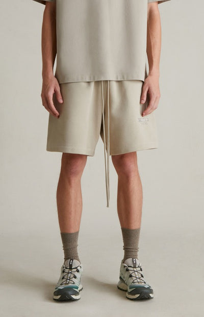 Fear of God Essentials SP25 Metallic Logo Shorts ‘Heather Stone’