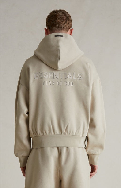 FEAR OF GOD ESSENTIALS Metallic Logo Full Zip Hoodie ‘Timber’ SP25