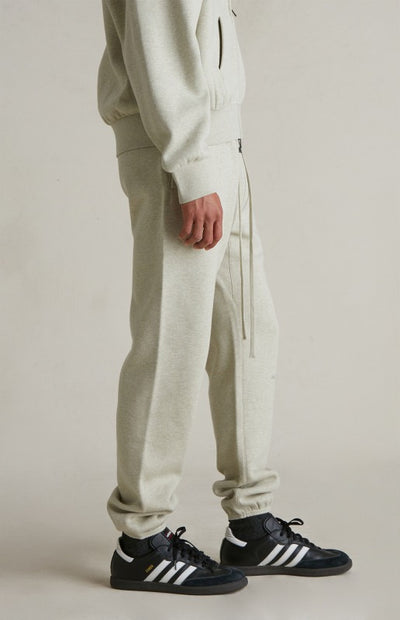 Fear Of God Essentials Vintage Metallic Logo Sweatpants ‘Heather Stone’ SP25
