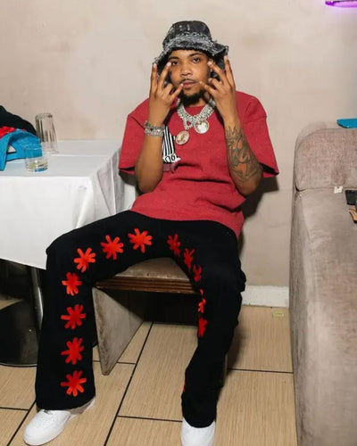 LOSTSHDWS Sun Logo Washed Flared Denim Jeans with Embroidered Details