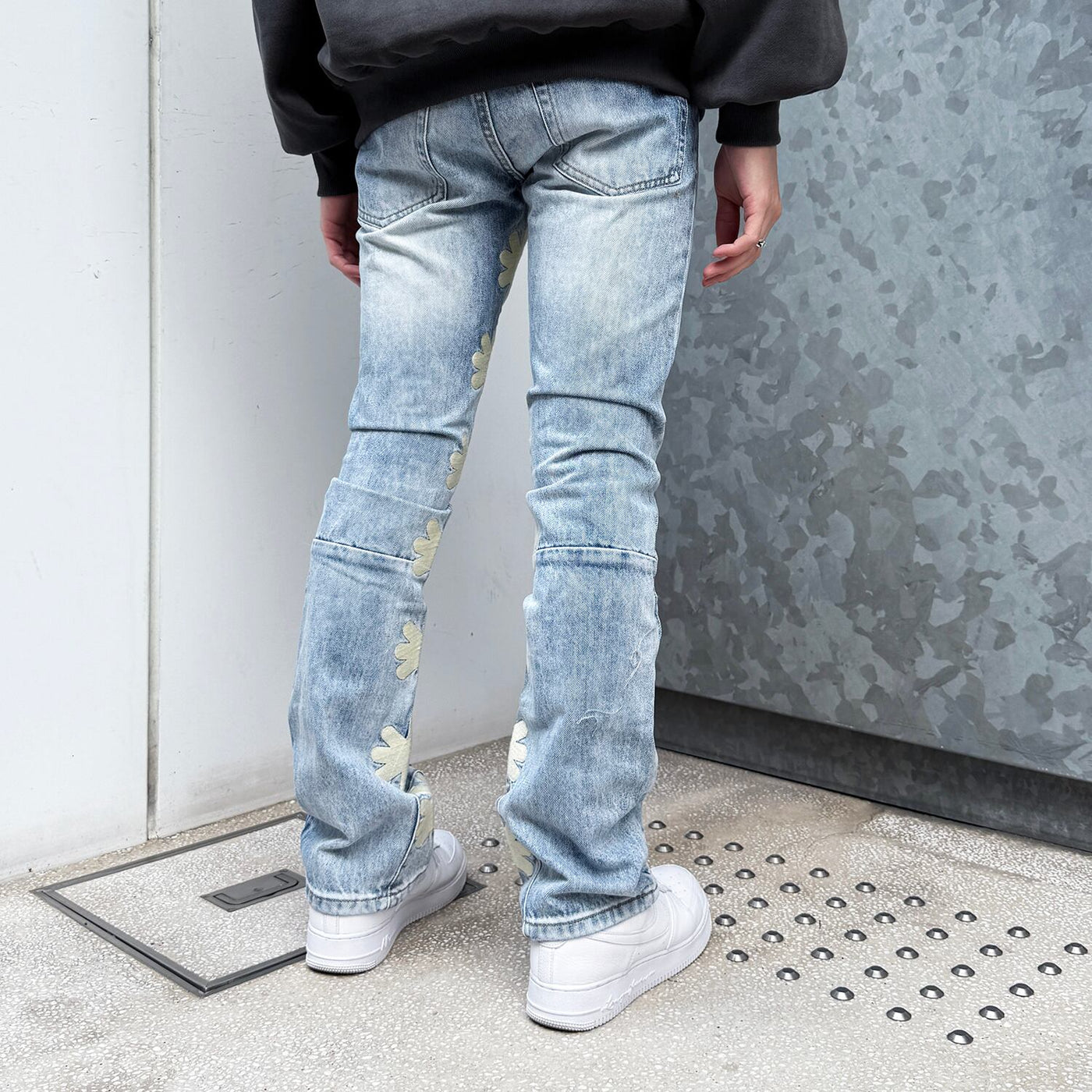 LOSTSHDWS Sun Logo Washed Flared Denim Jeans with Embroidered Details