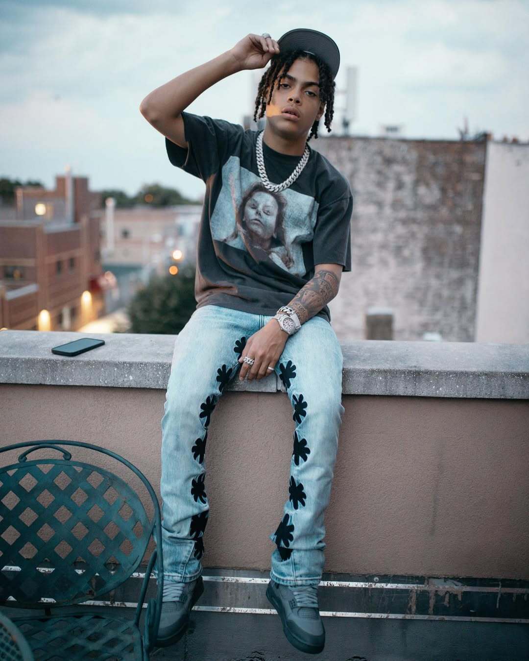 LOSTSHDWS Sun Logo Washed Flared Denim Jeans with Embroidered Details