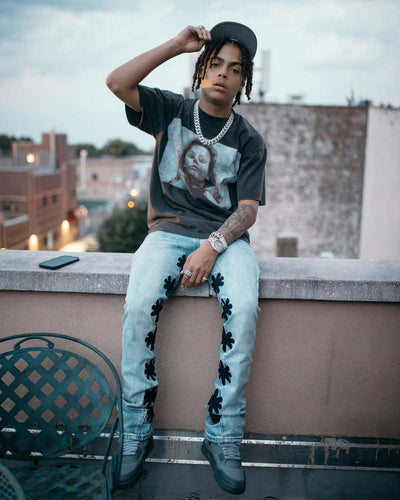 LOSTSHDWS Sun Logo Washed Flared Denim Jeans with Embroidered Details