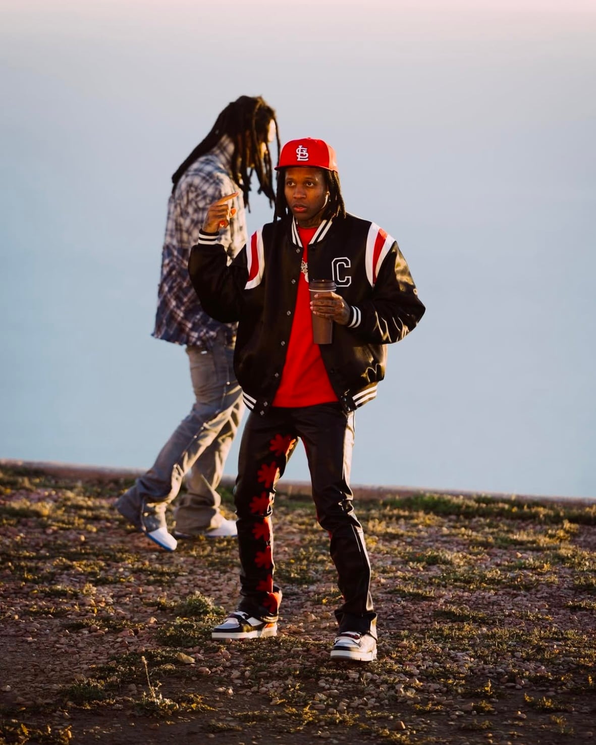 LOSTSHDWS Sun Logo Washed Flared Denim Jeans with Embroidered Details