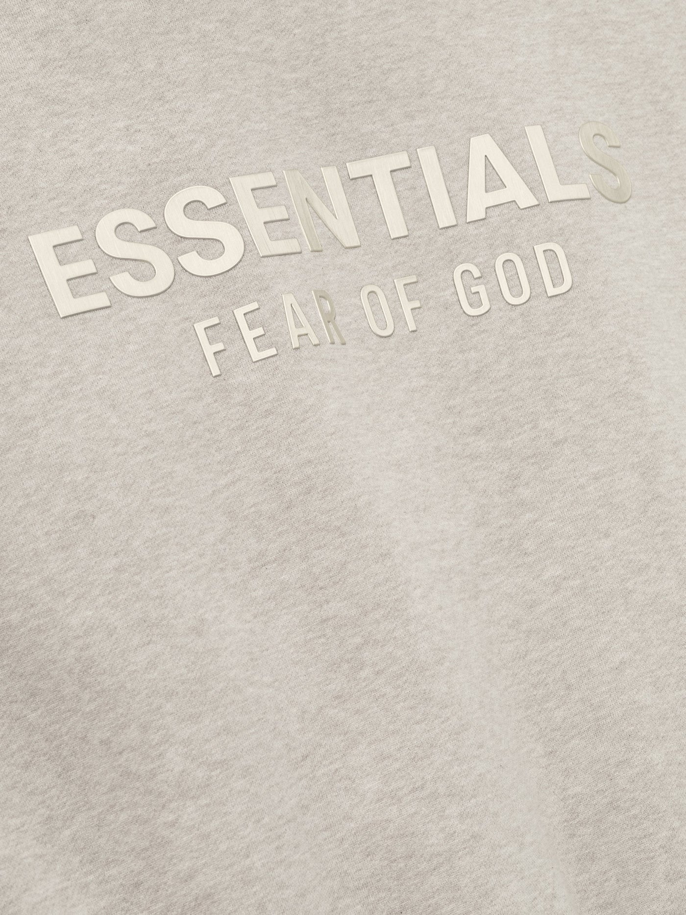 FEAR OF GOD ESSENTIALS Metallic Logo Fleece Hoodie ‘Heather Stone’ SP25