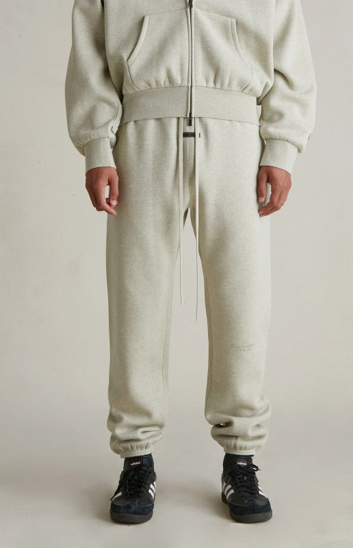Fear Of God Essentials Vintage Metallic Logo Sweatpants ‘Heather Stone’ SP25