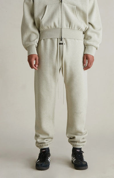 Fear Of God Essentials Vintage Metallic Logo Sweatpants ‘Heather Stone’ SP25