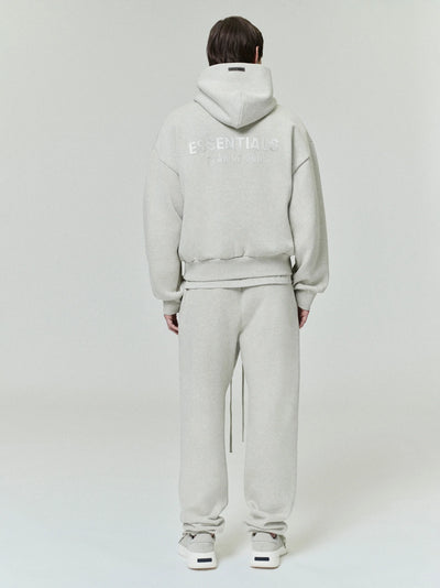 FEAR OF GOD ESSENTIALS Metallic Logo Fleece Hoodie ‘Heather Stone’ SP25