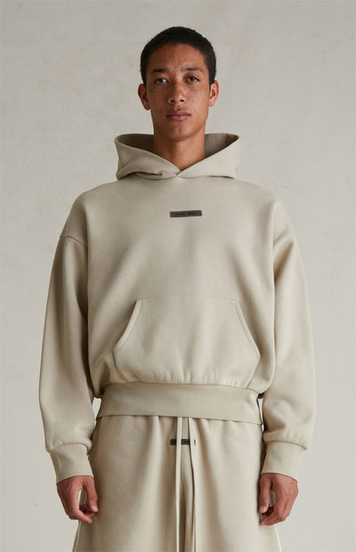 FEAR OF GOD ESSENTIALS Metallic Logo Fleece Hoodie ‘Timber’ SP25