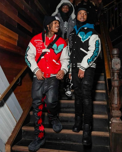 LOSTSHDWS Sun Logo Washed Flared Denim Jeans with Embroidered Details