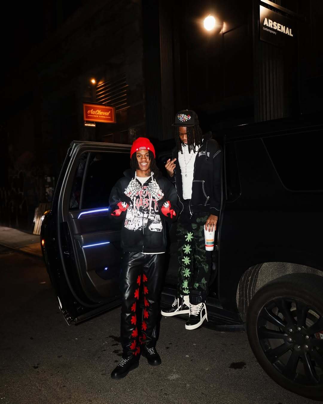 LOSTSHDWS Sun Logo Washed Flared Denim Jeans with Embroidered Details