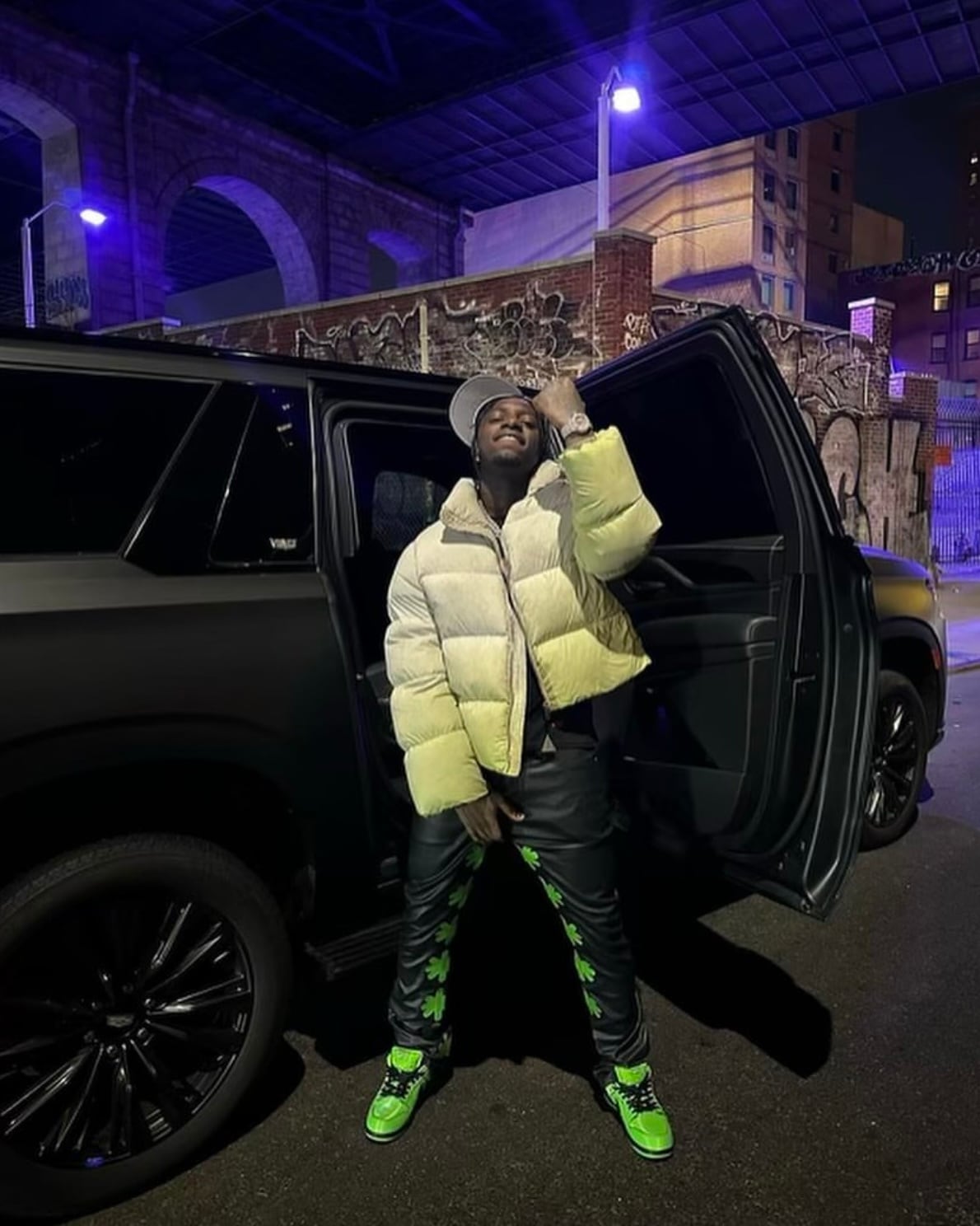 LOSTSHDWS Sun Logo Washed Flared Denim Jeans with Embroidered Details