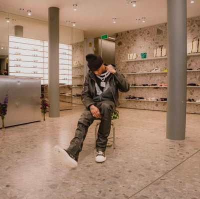 LOSTSHDWS Sun Logo Washed Flared Denim Jeans with Embroidered Details